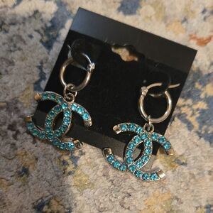 Elegant Silver and Blue Crystal Iconic Logo Earrings